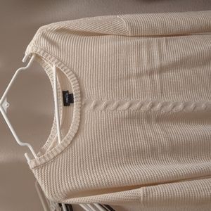 cream sweater